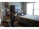 Comfortable bedroom featuring TV, soft carpet and grey walls at 11940 Wexford Club Dr, Roswell, GA 30075