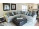 Inviting living room with a large, comfortable sectional sofa and stylish decor at 11940 Wexford Club Dr, Roswell, GA 30075