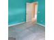 Bedroom with carpet, blue walls and an open door and doorway at 2424 Saint Andrews Rdg, College Park, GA 30337