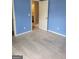 Carpeted bedroom with door open and showing bathroom in background at 2424 Saint Andrews Rdg, College Park, GA 30337