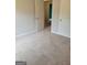 Bedroom featuring neutral walls, carpet, and a bright window at 2424 Saint Andrews Rdg, College Park, GA 30337