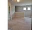 Upstairs bonus room with neutral paint and carpet at 2424 Saint Andrews Rdg, College Park, GA 30337