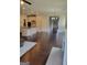 Bright, open-concept living area with hardwood floors flowing into the spacious kitchen and dining areas at 2424 Saint Andrews Rdg, College Park, GA 30337