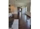 Spacious living room featuring hardwood floors, recessed lighting and a chandelier at 2424 Saint Andrews Rdg, College Park, GA 30337