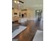 Open floor plan showcasing hardwood floors, a kitchen island, and recessed lighting at 2424 Saint Andrews Rdg, College Park, GA 30337