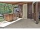 Attached carport featuring a storage shed with access to the home's entrance gate at 36 Cobblestone Crk, Peachtree City, GA 30269