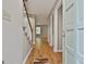 Welcoming foyer with wood flooring, staircase, neutral walls, and natural light at 36 Cobblestone Crk, Peachtree City, GA 30269