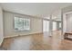 Inviting living area with wood floors and abundant light at 36 Cobblestone Crk, Peachtree City, GA 30269