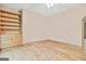 Bedroom with hardwood floors and built-in shelving at 936 Bo Bo Banks Rd, Grantville, GA 30220