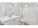 Bright bathroom with white fixtures, including a shower/tub and vanity at 1528 Wembley Dr, Douglasville, GA 30134