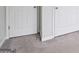 New gray carpet with white door frame and baseboard trim on a freshly painted wall at 1528 Wembley Dr, Douglasville, GA 30134