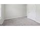 Bedroom featuring neutral walls, plush carpet, a window with natural light, and closet space at 1528 Wembley Dr, Douglasville, GA 30134