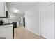 Kitchen with access to other rooms boasts neutral tones and modern appliances at 1528 Wembley Dr, Douglasville, GA 30134