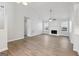Bright living room with wood-look flooring, fireplace and neutral paint at 1528 Wembley Dr, Douglasville, GA 30134