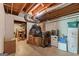 Basement storage area with boxes, shelving, and open ceiling, offering potential for organization at 2864 Wyndcliff Ct, Marietta, GA 30066