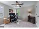Bright room with neutral carpet, ceiling fan, and a desk setup perfect for a home office at 2864 Wyndcliff Ct, Marietta, GA 30066