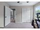 Bedroom with neutral carpet, closet, and two windows providing natural light at 2864 Wyndcliff Ct, Marietta, GA 30066