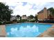 Sparkling community pool with plenty of seating and lush landscaping, ideal for summer fun at 2864 Wyndcliff Ct, Marietta, GA 30066