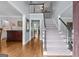 Inviting foyer with hardwood floors and staircase leading to the second floor at 2864 Wyndcliff Ct, Marietta, GA 30066