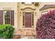 Charming front door entrance framed with decorative plants and stone pathway at 2864 Wyndcliff Ct, Marietta, GA 30066