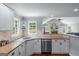 Bright, white kitchen with granite countertops, stainless steel appliances, and natural light at 2864 Wyndcliff Ct, Marietta, GA 30066