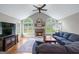 Bright living room with fireplace, vaulted ceiling, and large windows providing natural light at 2864 Wyndcliff Ct, Marietta, GA 30066