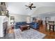 Spacious living room with a fireplace, large windows, and comfortable seating area at 2864 Wyndcliff Ct, Marietta, GA 30066