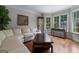 Bright living room with a large sectional sofa and views of the exterior at 2864 Wyndcliff Ct, Marietta, GA 30066