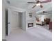 This main bedroom features a fireplace, ceiling fan, and an elegant connecting doorway at 2864 Wyndcliff Ct, Marietta, GA 30066