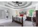 Charming main bedroom featuring a fireplace, trey ceiling and adjoining bathroom at 2864 Wyndcliff Ct, Marietta, GA 30066