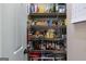 Well-stocked pantry with multiple shelves for organized storage at 2864 Wyndcliff Ct, Marietta, GA 30066