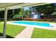 Refreshing backyard pool with ample space for relaxation and recreation with a storage shed near by at 2913 Jordan Forest Trail, Lawrenceville, GA 30044