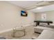 Basement featuring a pool table, cozy seating, and a large television for entertainment at 4064 Chimney Ridge Way, Ellenwood, GA 30294