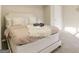Bright bedroom with a comfortable bed, soft lighting, and serene decor at 4064 Chimney Ridge Way, Ellenwood, GA 30294