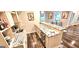 Charming bar area features granite countertops, stainless steel appliances, and natural light at 4564 Investors Ln, Ellenwood, GA 30294