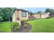 Beautifully landscaped yard accentuates this well-maintained brick home at 4564 Investors Ln, Ellenwood, GA 30294