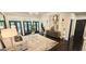 Bright living room with neutral decor, large windows, and access to the outdoor space at 4564 Investors Ln, Ellenwood, GA 30294