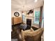 Cozy living room with fireplace, stylish furniture, and elegant decor, creating a warm and inviting atmosphere at 4564 Investors Ln, Ellenwood, GA 30294