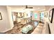 Relaxing living room with a bar area, hardwood floors, and comfortable seating at 4564 Investors Ln, Ellenwood, GA 30294