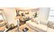 Bright open concept living room and kitchen with dark wood floors and comfortable seating at 4564 Investors Ln, Ellenwood, GA 30294