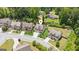 Aerial view of a beautiful home with well-maintained landscaping in a quiet neighborhood at 4972 Park Vale Dr, Sugar Hill, GA 30518