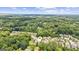 Aerial view of the property showcasing its location within a lush, green neighborhood at 4972 Park Vale Dr, Sugar Hill, GA 30518