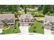 Aerial view of a beautiful home with well-maintained landscaping and a spacious backyard at 4972 Park Vale Dr, Sugar Hill, GA 30518