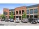Street view of Rivermill Bakery in a brick building with parking and landscape at 4972 Park Vale Dr, Sugar Hill, GA 30518