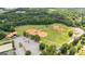 Overhead view of multiple baseball and softball fields at a community park at 4972 Park Vale Dr, Sugar Hill, GA 30518