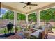 Charming outdoor patio area featuring a grill, comfortable seating, and scenic backyard views at 4972 Park Vale Dr, Sugar Hill, GA 30518