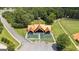 Overhead view of a park featuring a large pavilion, playground, and green spaces at 4972 Park Vale Dr, Sugar Hill, GA 30518