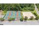 Aerial view of the pickleball courts and beach volleyball court within the community at 4972 Park Vale Dr, Sugar Hill, GA 30518