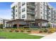 Exterior view of a Mexican restaurant with a patio, offering a vibrant dining experience with lush landscaping and ample seating at 4972 Park Vale Dr, Sugar Hill, GA 30518