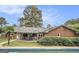 The backyard offers an in-ground swimming pool and screened porch, perfect for relaxing and entertaining at 1083 Hampton Rd, Hampton, GA 30228